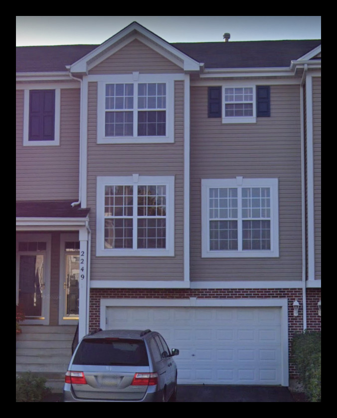 2249 Hudson Circle Aurora, IL 60502 - Photo 1 of 30 a front view of a house with a yard