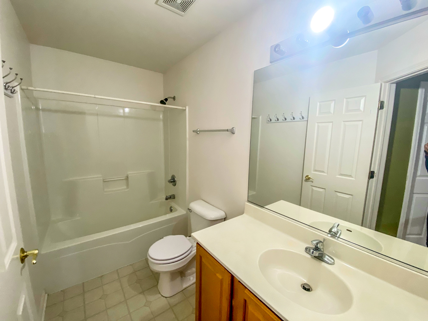 2249 Hudson Circle Aurora, IL 60502 - Photo 14 of 30 a bathroom with a sink toilet and shower