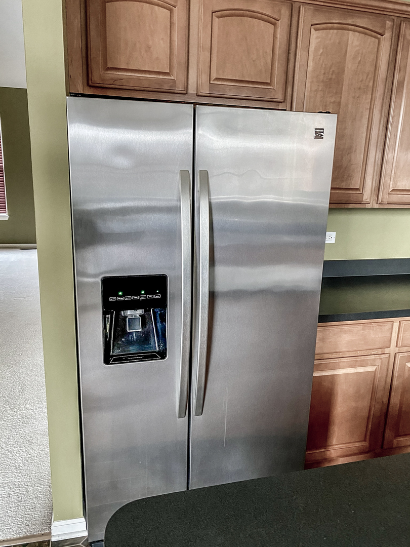 2249 Hudson Circle Aurora, IL 60502 - Photo 3 of 30 a close view of a refrigerator in kitchen
