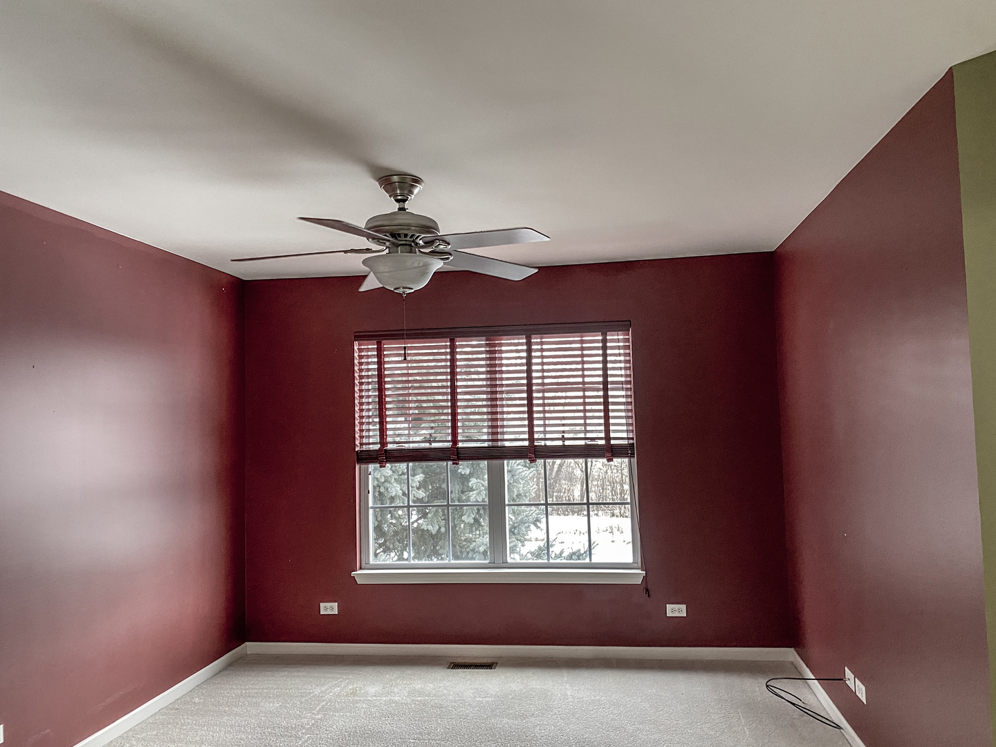 2249 Hudson Circle Aurora, IL 60502 - Photo 5 of 30 an empty room with windows and fan