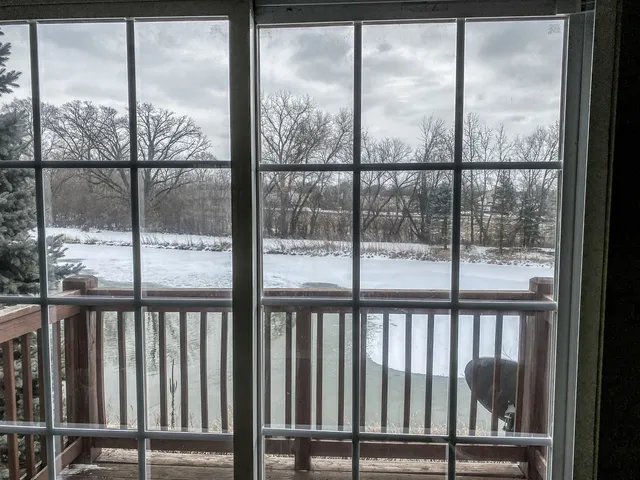 a view of a gate and fence