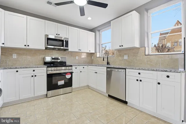 $298,900 | 1803 Hollins Street, Baltimore, MD 21223