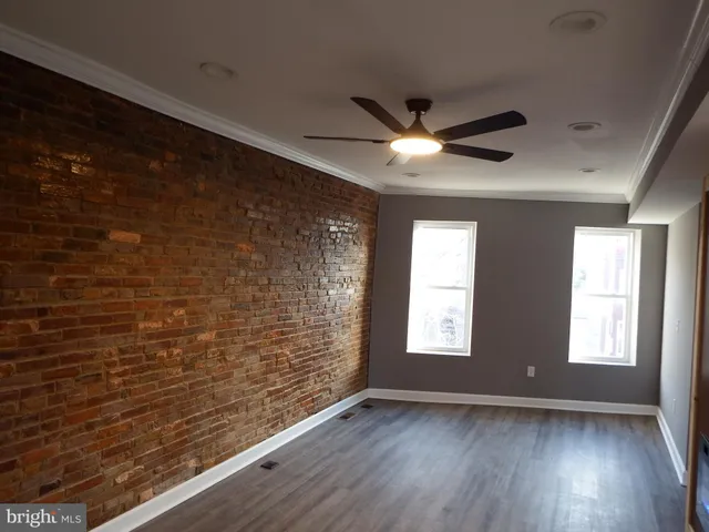 a view of an empty room and window