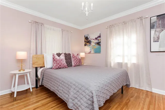 a bathroom with a sink and mirror with painted walls