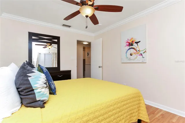 a bedroom with bed and window