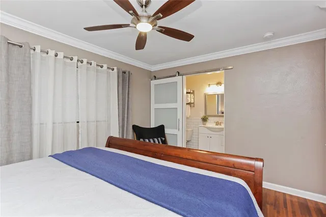 a bathroom with a sink a mirror and shower