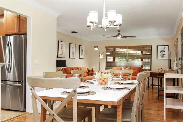 a bedroom with two beds and a couch