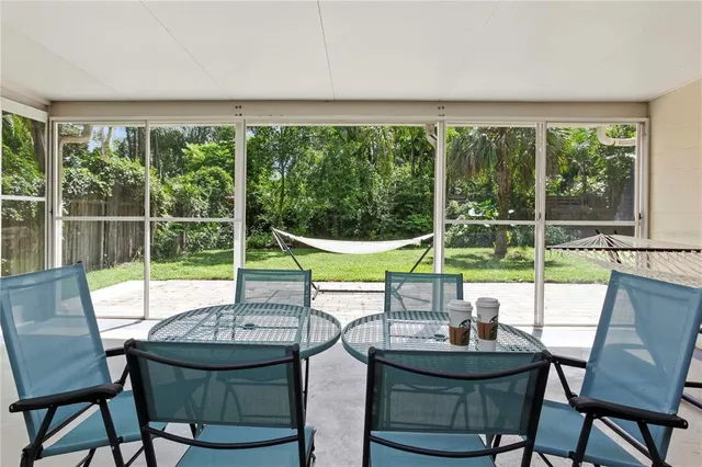a backyard of a house with seating space