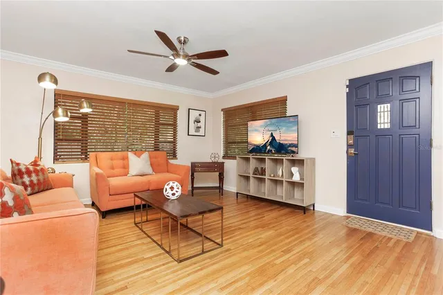 a kitchen with stainless steel appliances granite countertop a refrigerator stove and sink