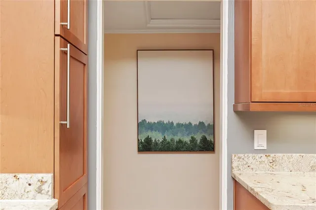 a view of a dining room with furniture and window