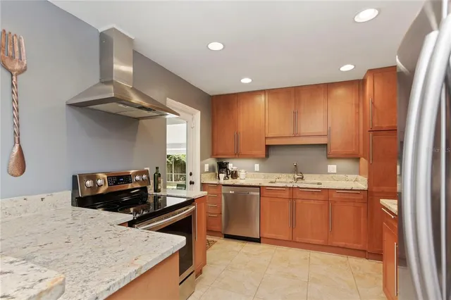 a bathroom with a sink and mirror with painted walls
