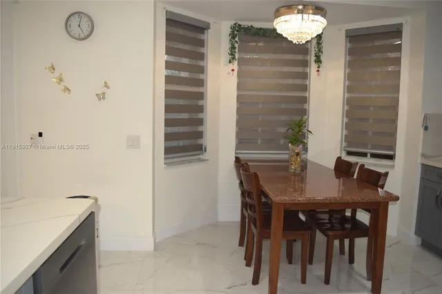 a view of a dining room with furniture