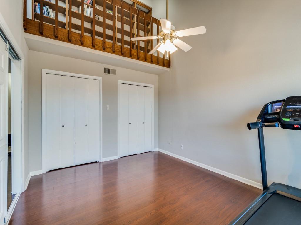 1028 Signal Ridge Place Rockwall, TX 75032 - Photo 11 of 27 a view of a room with wooden floor