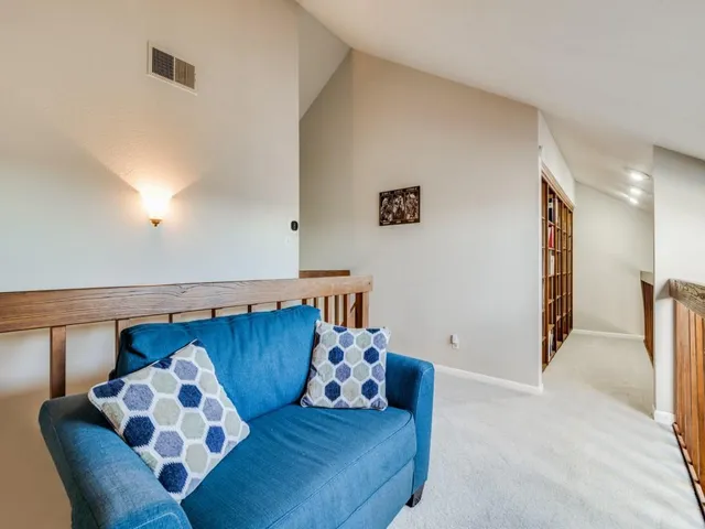a living room with furniture and couch