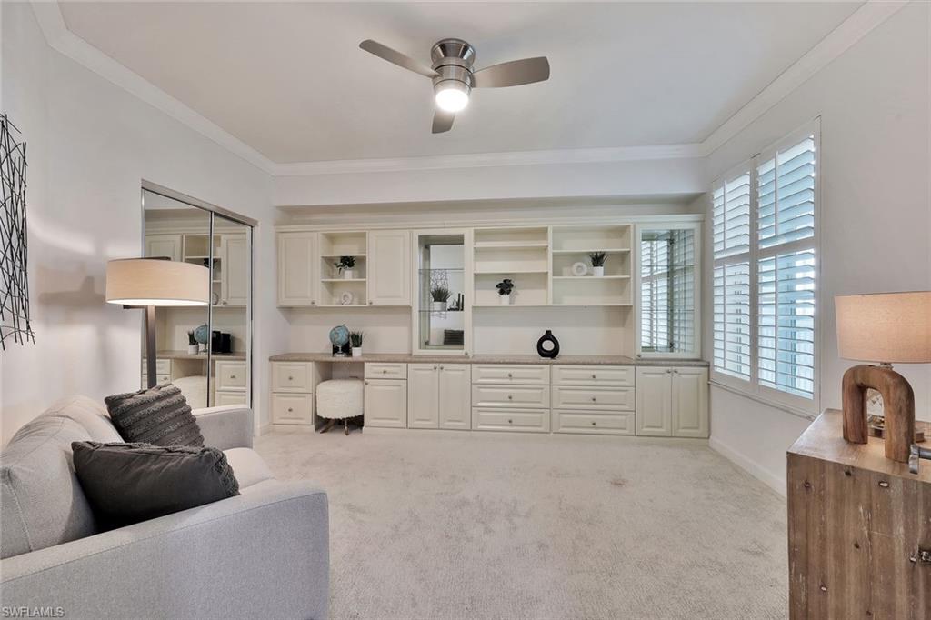 300 Dunes Boulevard, Unit 605 Naples, FL 34110 - Photo 19 of 37 a living room with furniture and a window