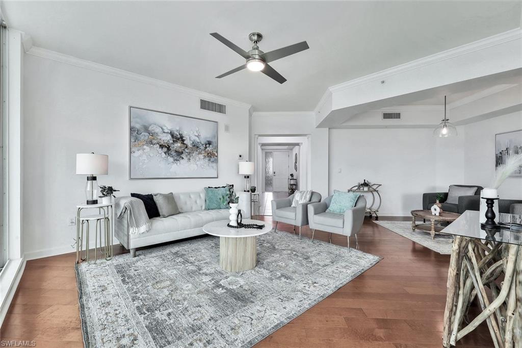 300 Dunes Boulevard, Unit 605 Naples, FL 34110 - Photo 5 of 37 a living room with furniture