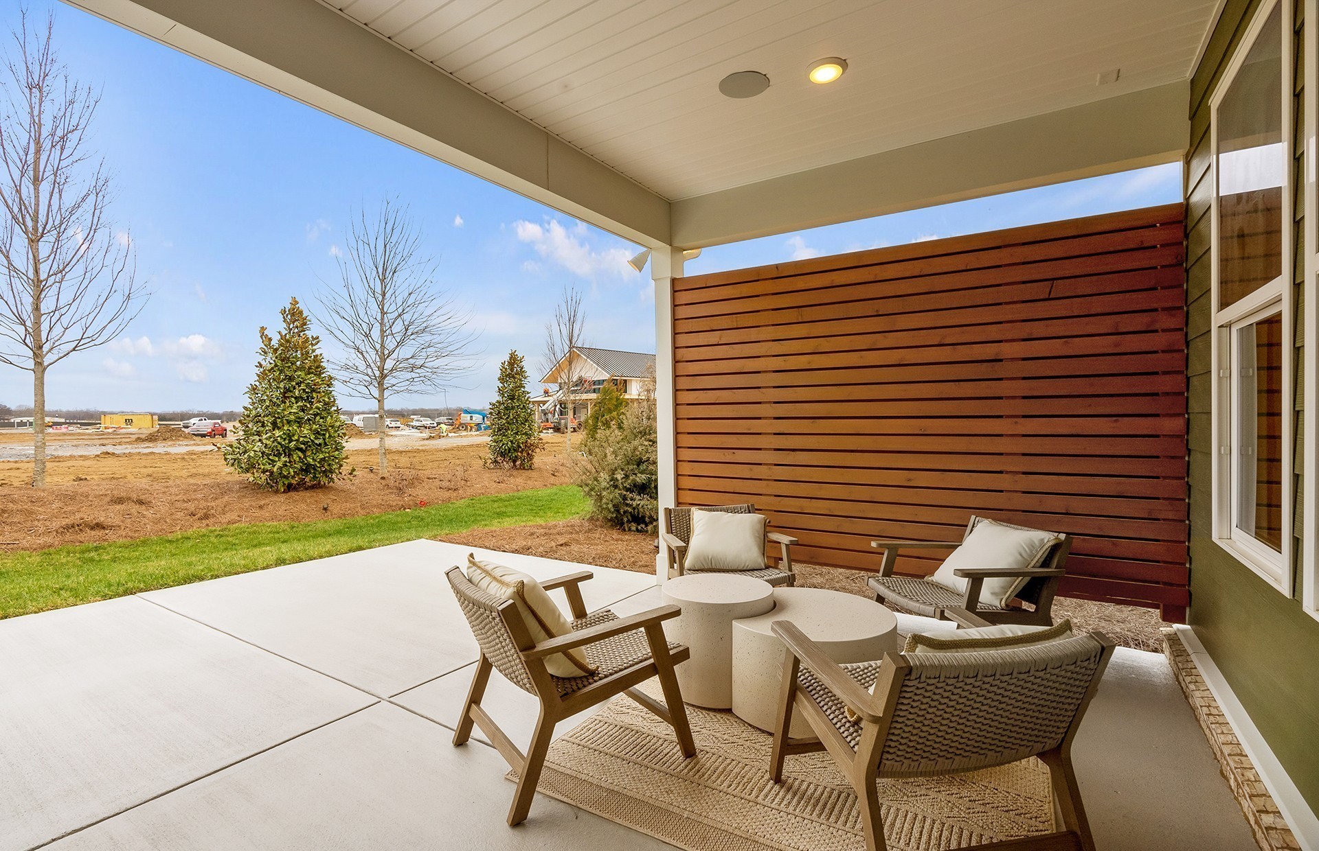 511 Scarlet Oak Road Lebanon, TN 37090 - Photo 15 of 32 a patio with table and chairs and potted plants