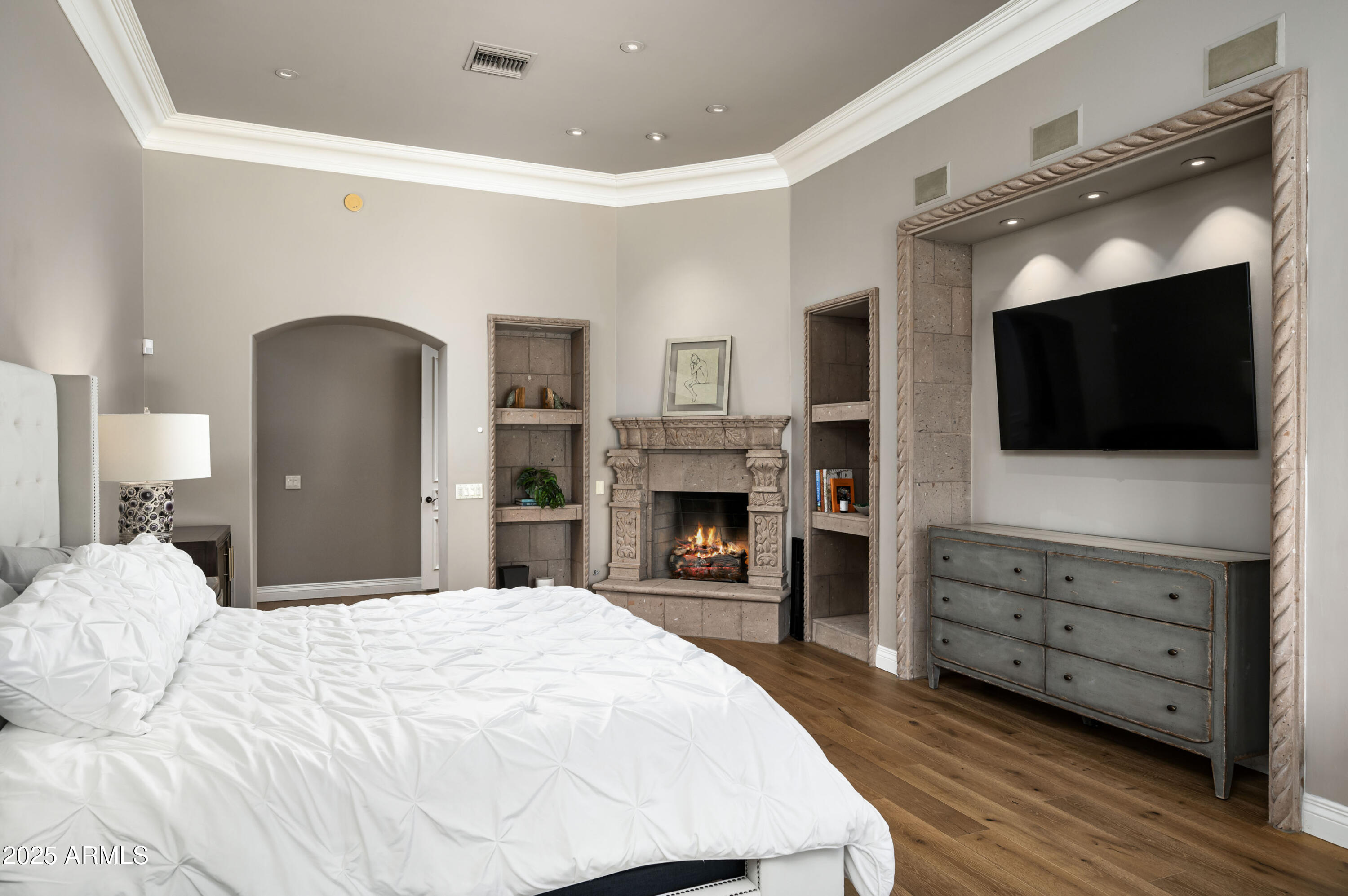 8150 North Ridgeview Drive Paradise Valley, AZ 85253 - Photo 17 of 37 a spacious bedroom with a bed and a flat screen tv