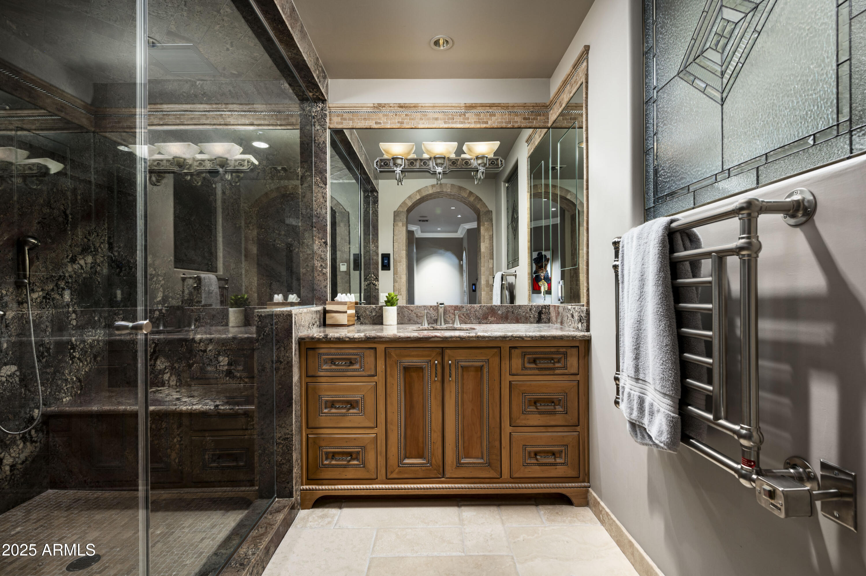 8150 North Ridgeview Drive Paradise Valley, AZ 85253 - Photo 19 of 37 a bathroom with a granite countertop sink a mirror and a shower