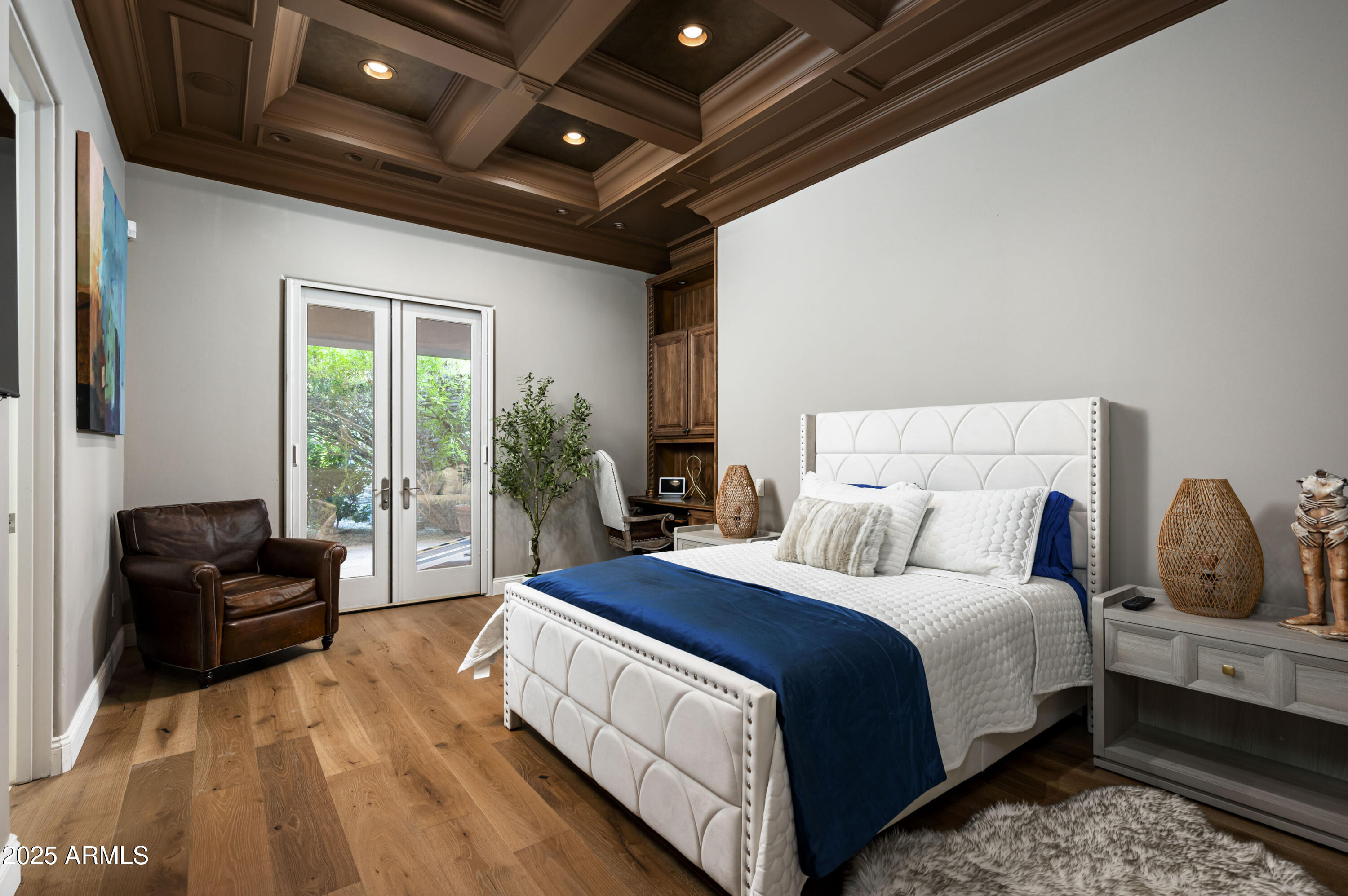 8150 North Ridgeview Drive Paradise Valley, AZ 85253 - Photo 22 of 37 a bedroom with bed or furniture and a couch