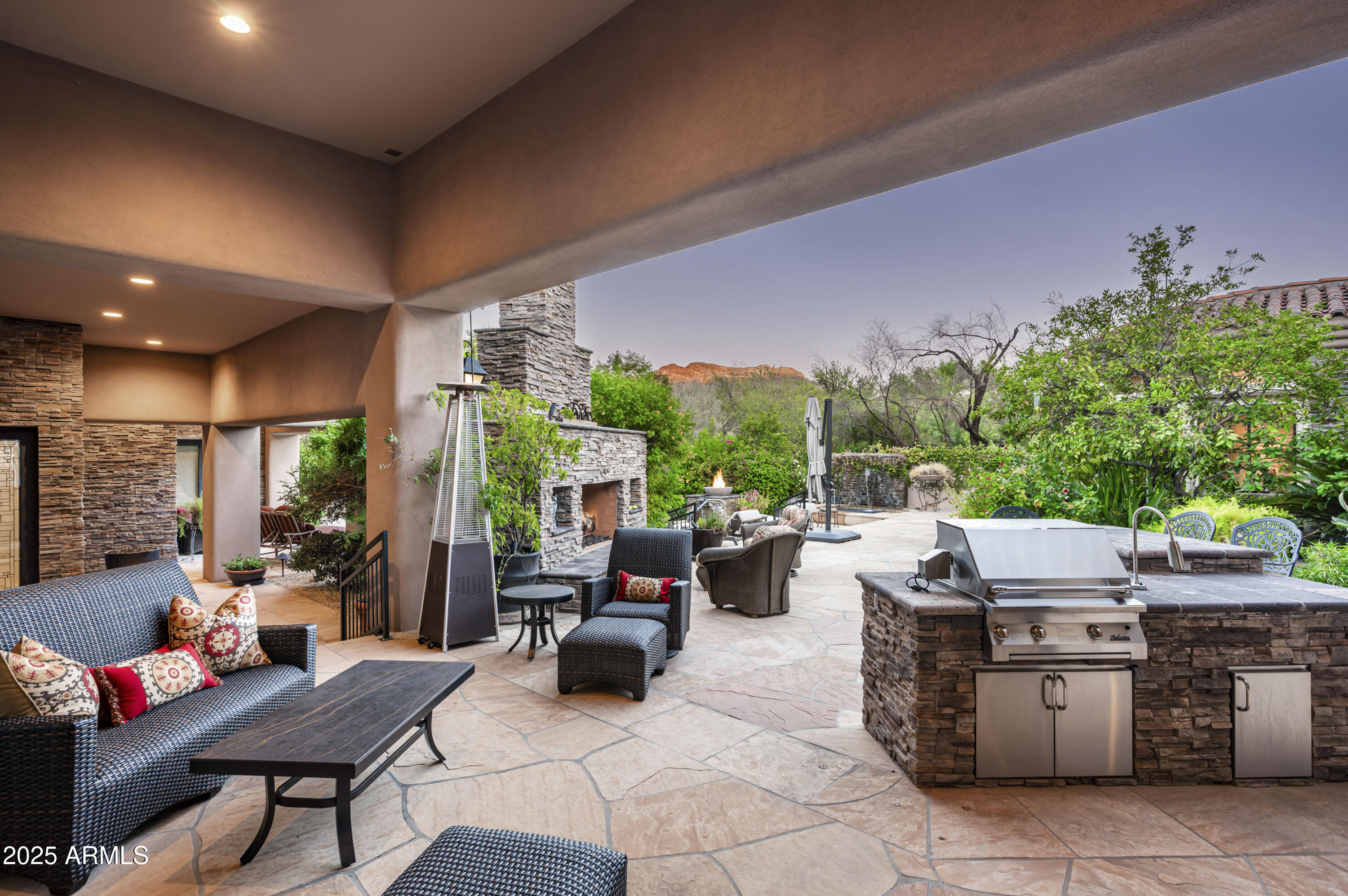 8150 North Ridgeview Drive Paradise Valley, AZ 85253 - Photo 32 of 37 a living room with furniture and a potted plant