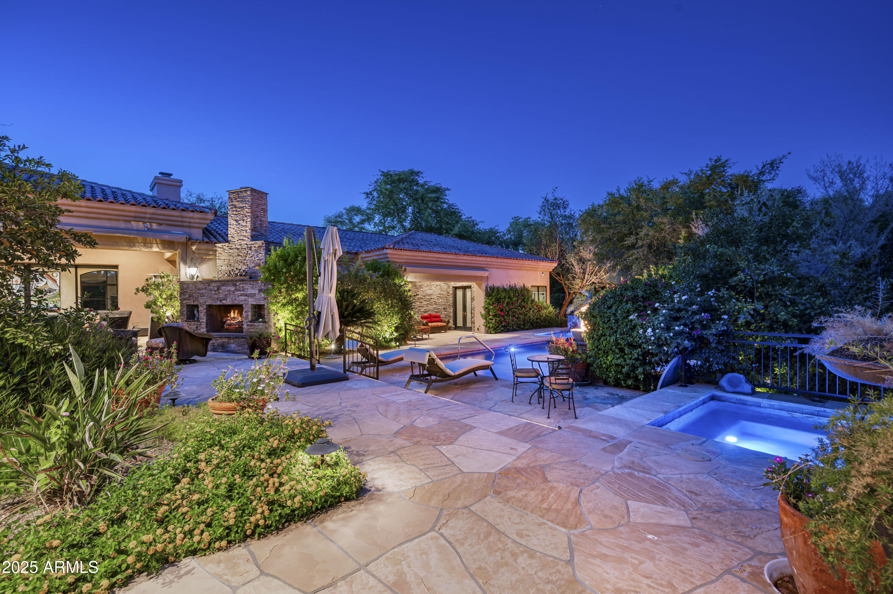 8150 North Ridgeview Drive Paradise Valley, AZ 85253 - Photo 36 of 37 a view of a house with sitting area and garden