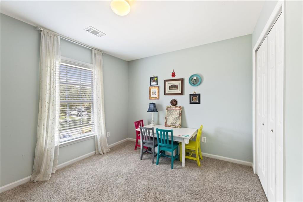 5415 Fieldfreen Drive Cumming, GA 30028 - Photo 22 of 40 a dining room with furniture and window