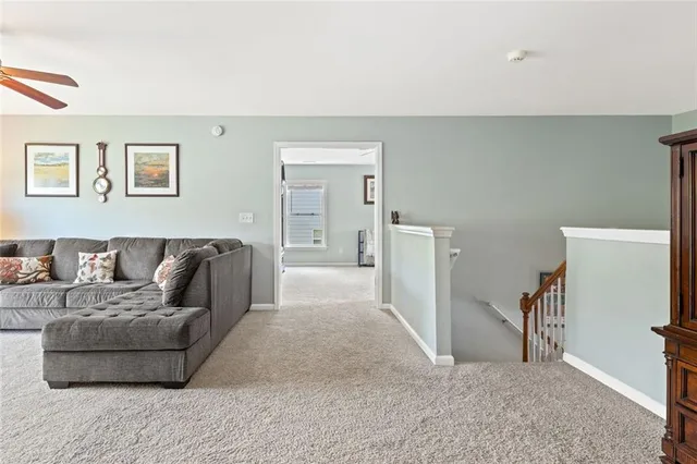 a living room with furniture and a couch