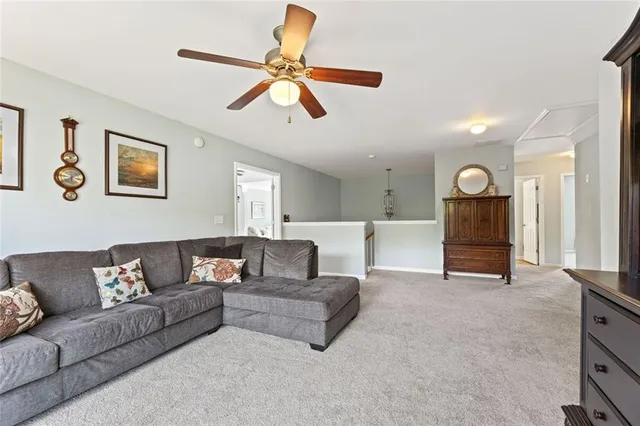 a living room with furniture and window