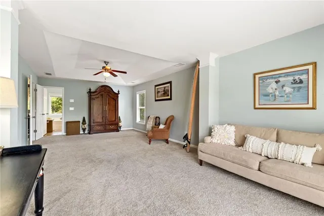 a living room with furniture and a table