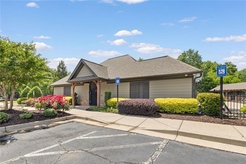 5415 Fieldfreen Drive Cumming, GA 30028 - Photo 39 of 40 a front view of a house with a yard and a garage