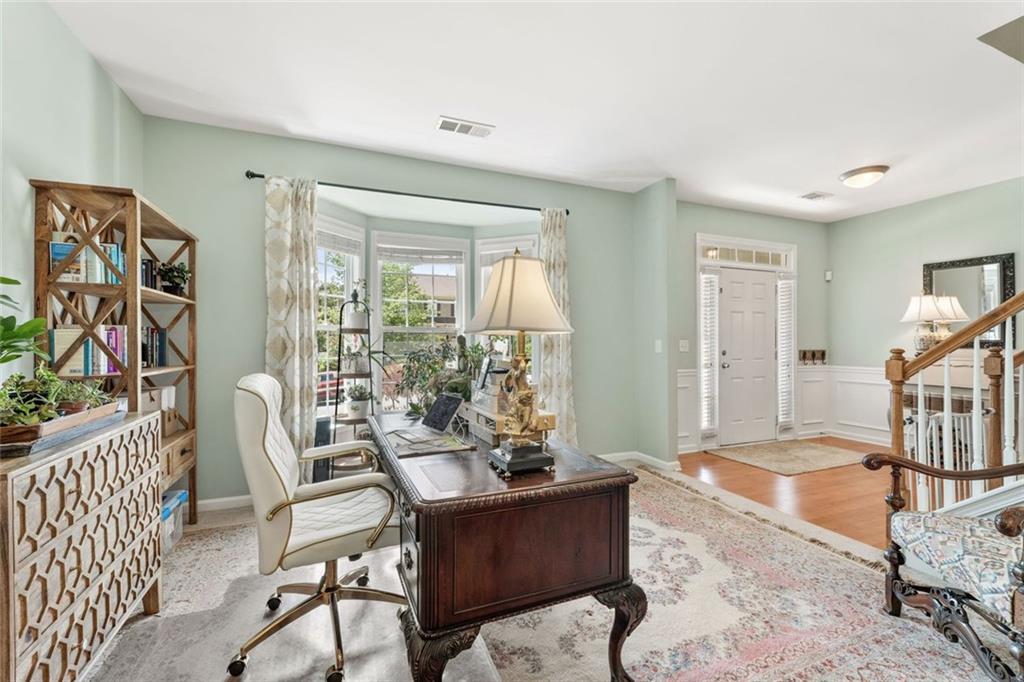 5415 Fieldfreen Drive Cumming, GA 30028 - Photo 8 of 40 a living room with furniture and a window