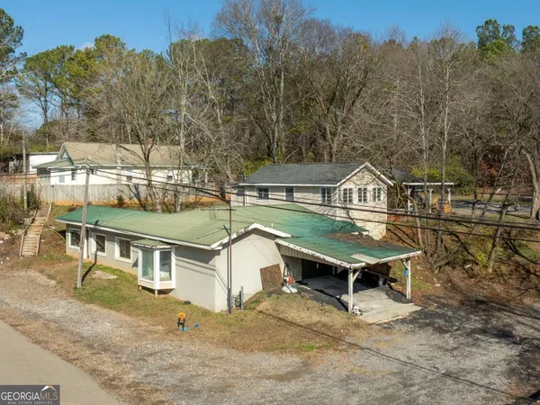 a view of a swimming pool with a patio