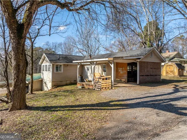 a view of house with outdoor space