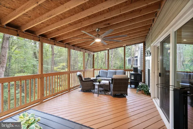 a outdoor living space with patio furniture and garden view