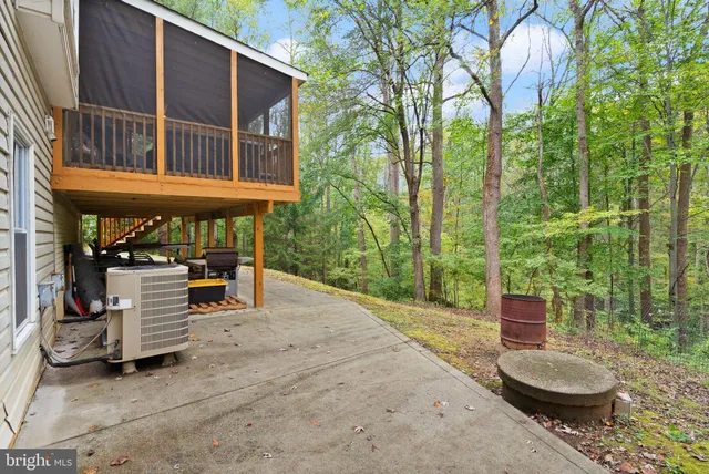 a picture of a bathroom with a shower