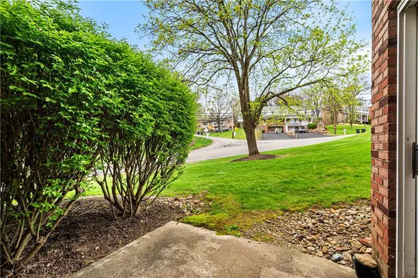 a bedroom with a bed and chair