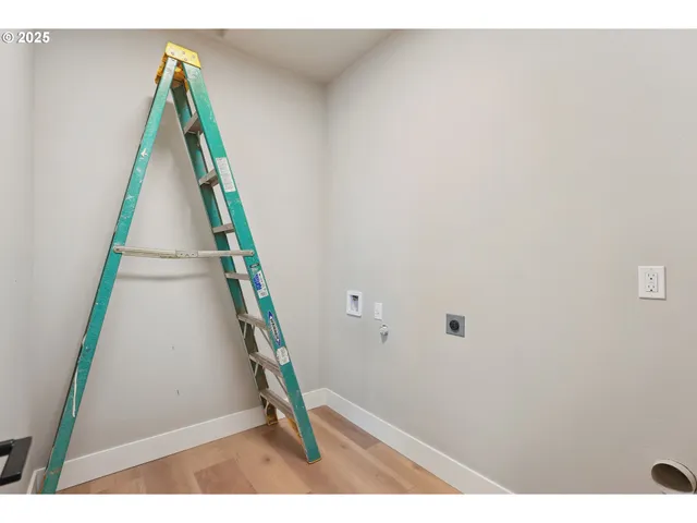 a view of an entryway with a door