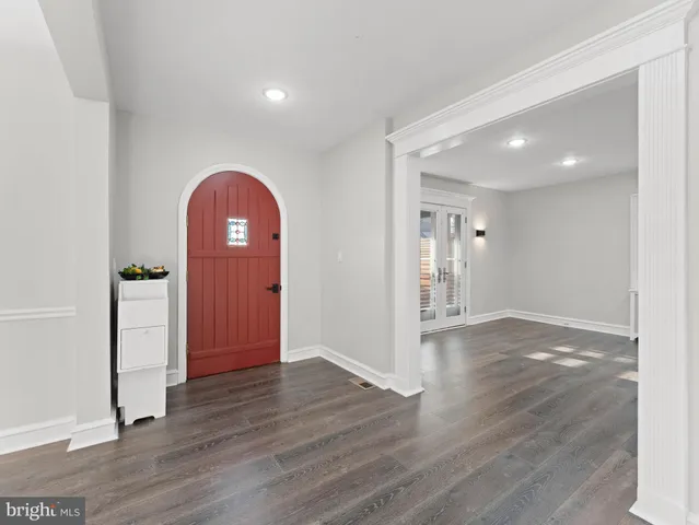 a view of a dining room with furniture and window