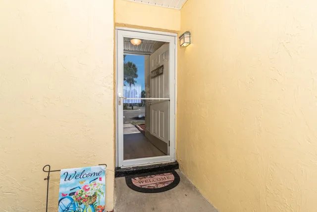 a room with a door and couch