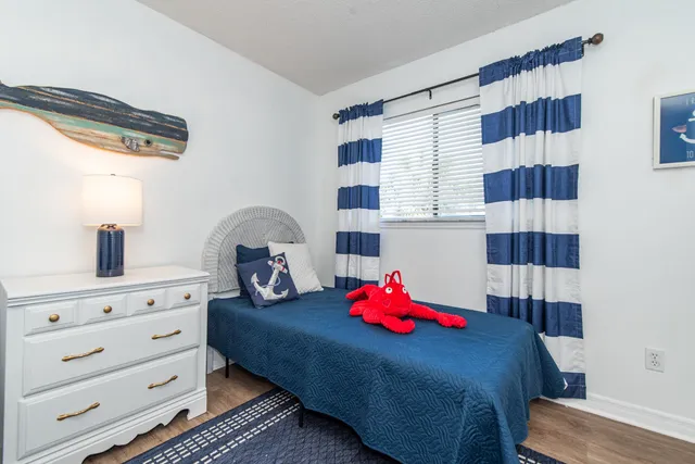 a view of a park with large trees