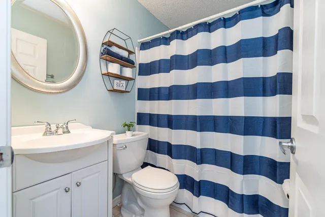 a view of yard with swimming pool and trees