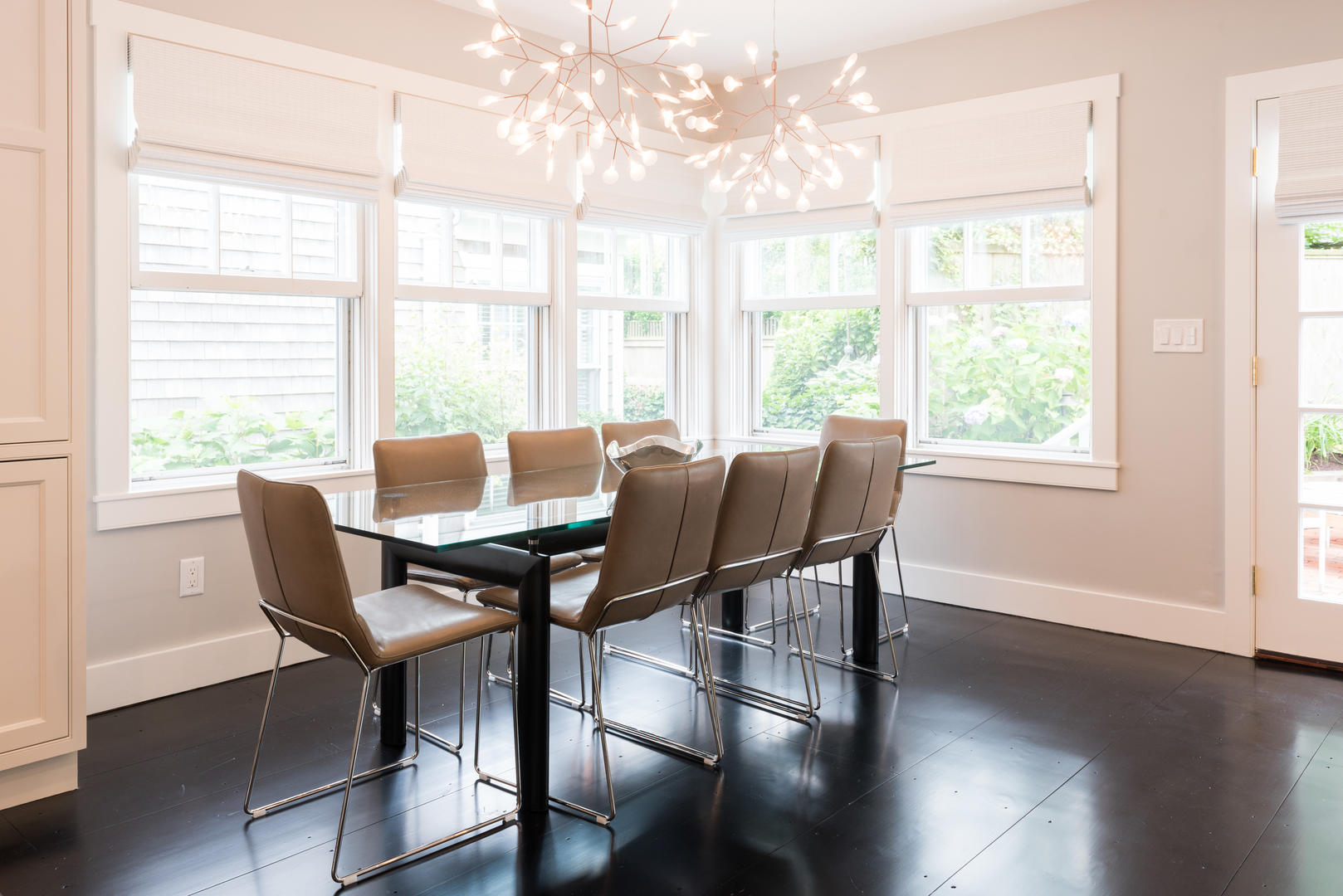 59 Orange Street Nantucket, MA 02554 - Photo 11 of 42 a view of a dining room with furniture window and outside view