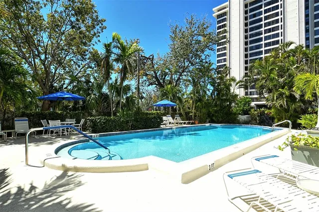 a view of a building with sitting area