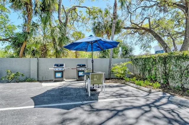 a view of a building with sitting area