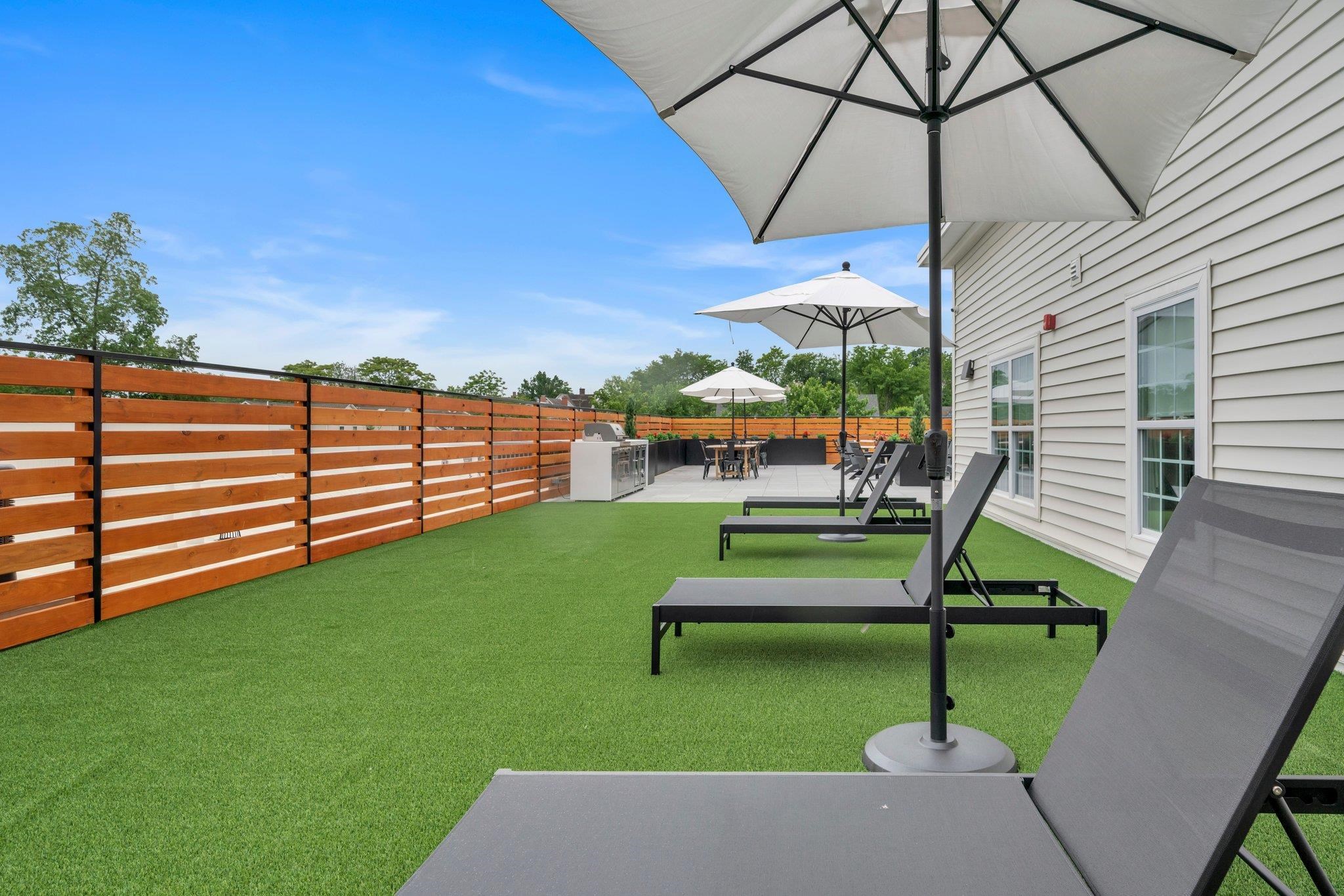 74 Ridgedale Avenue, Unit 304 Morristown, NJ 07960 - Photo 2 of 42 swimming pool view with a garden space