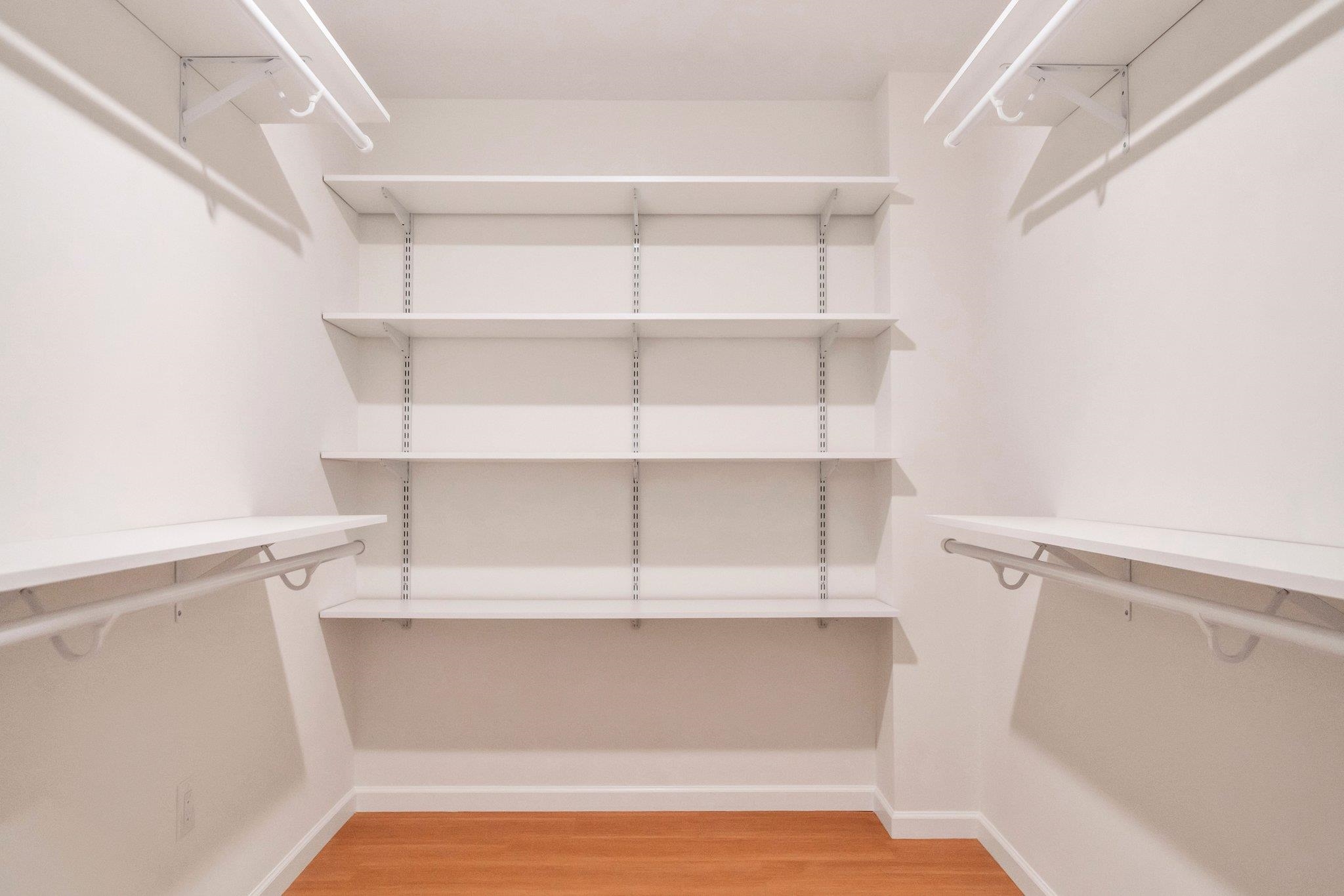 74 Ridgedale Avenue, Unit 304 Morristown, NJ 07960 - Photo 22 of 42 a view of walk in closet with empty racks