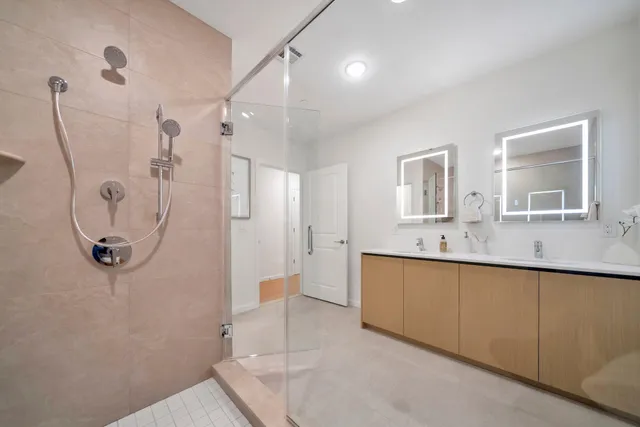 a bedroom with a bed and a lamp