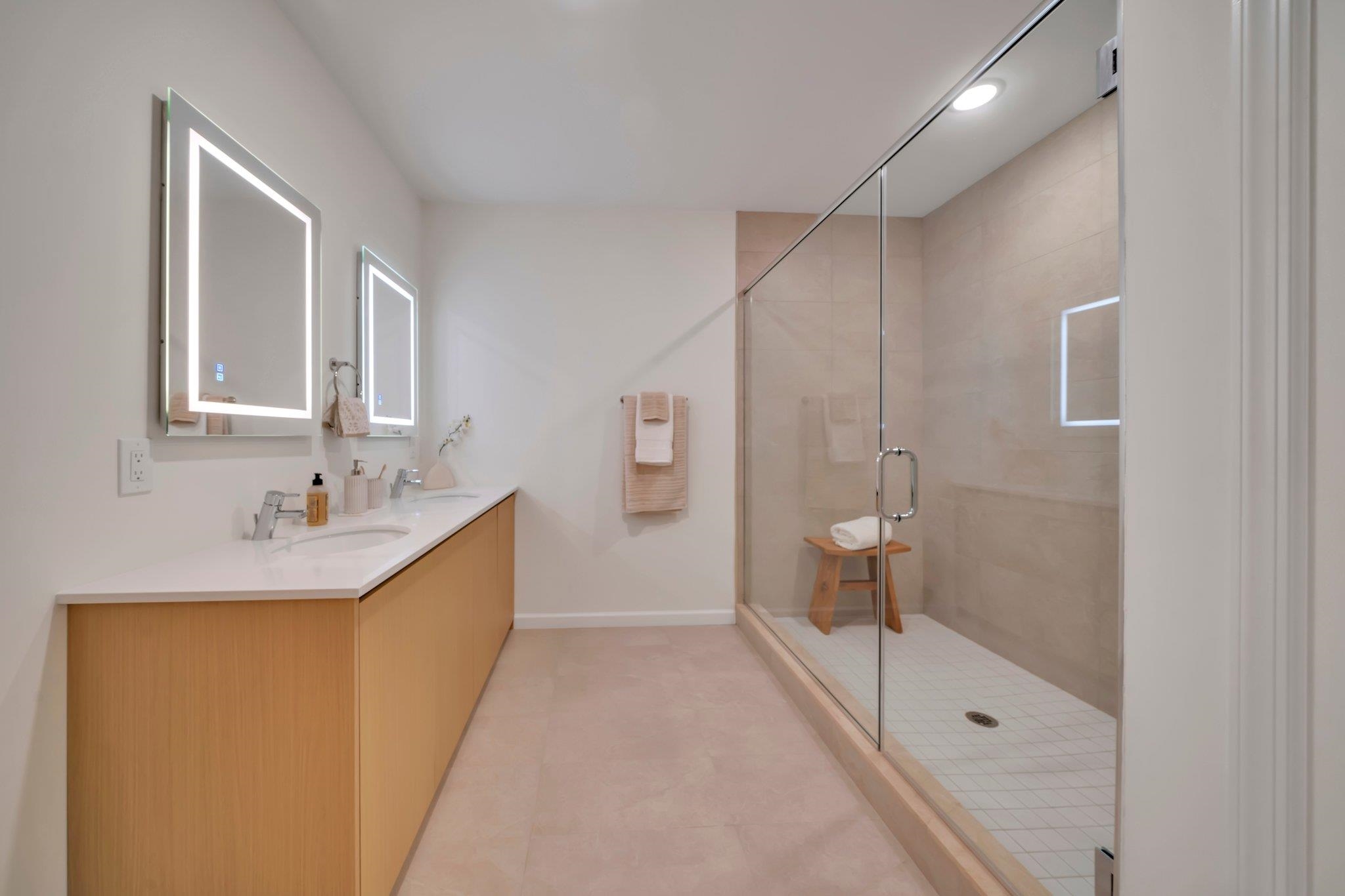 74 Ridgedale Avenue, Unit 304 Morristown, NJ 07960 - Photo 32 of 42 a bathroom with a sink a toilet and shower