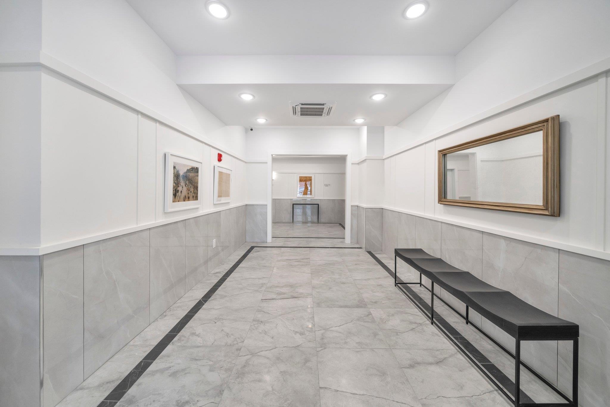 74 Ridgedale Avenue, Unit 304 Morristown, NJ 07960 - Photo 33 of 42 a big room with chandelier fan and windows